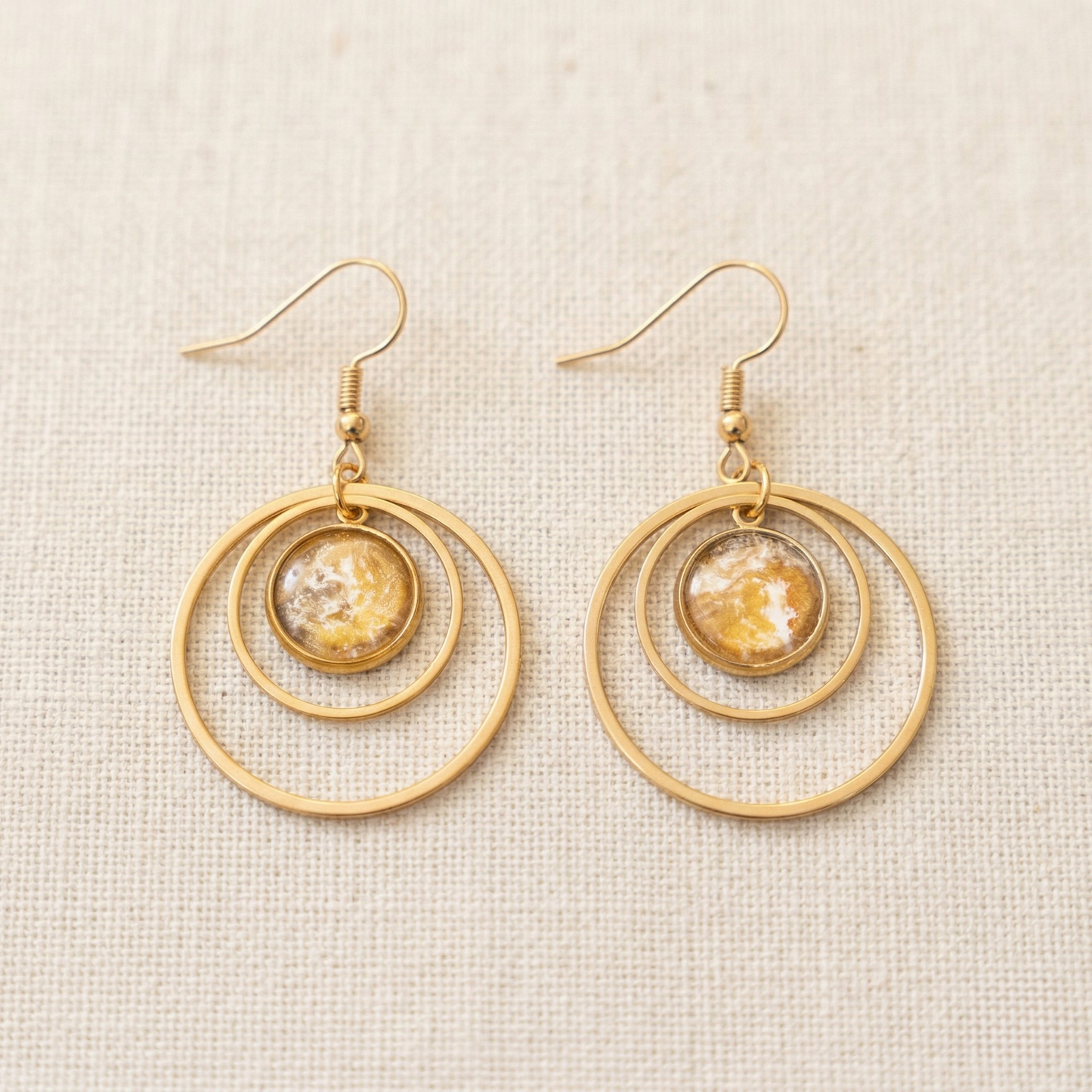 Oorbellen Puck | rvs design met dubbele ringen, bruin, oker, wit